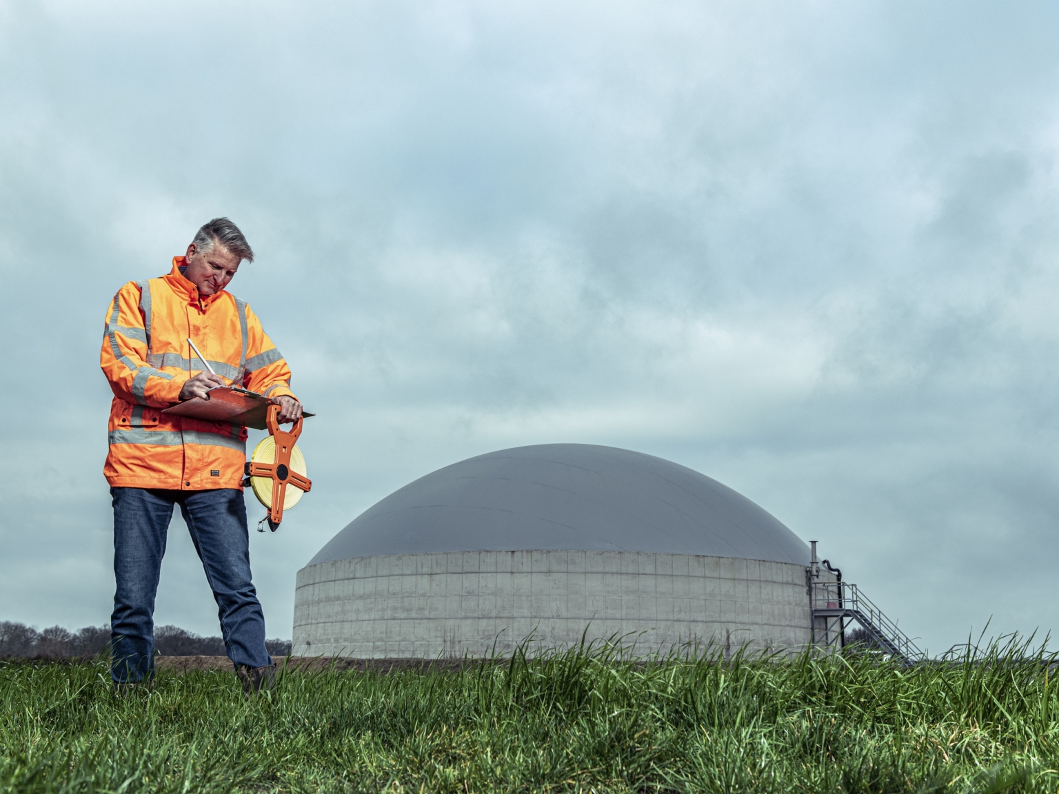 Technician at a biogas double-membrane cover
