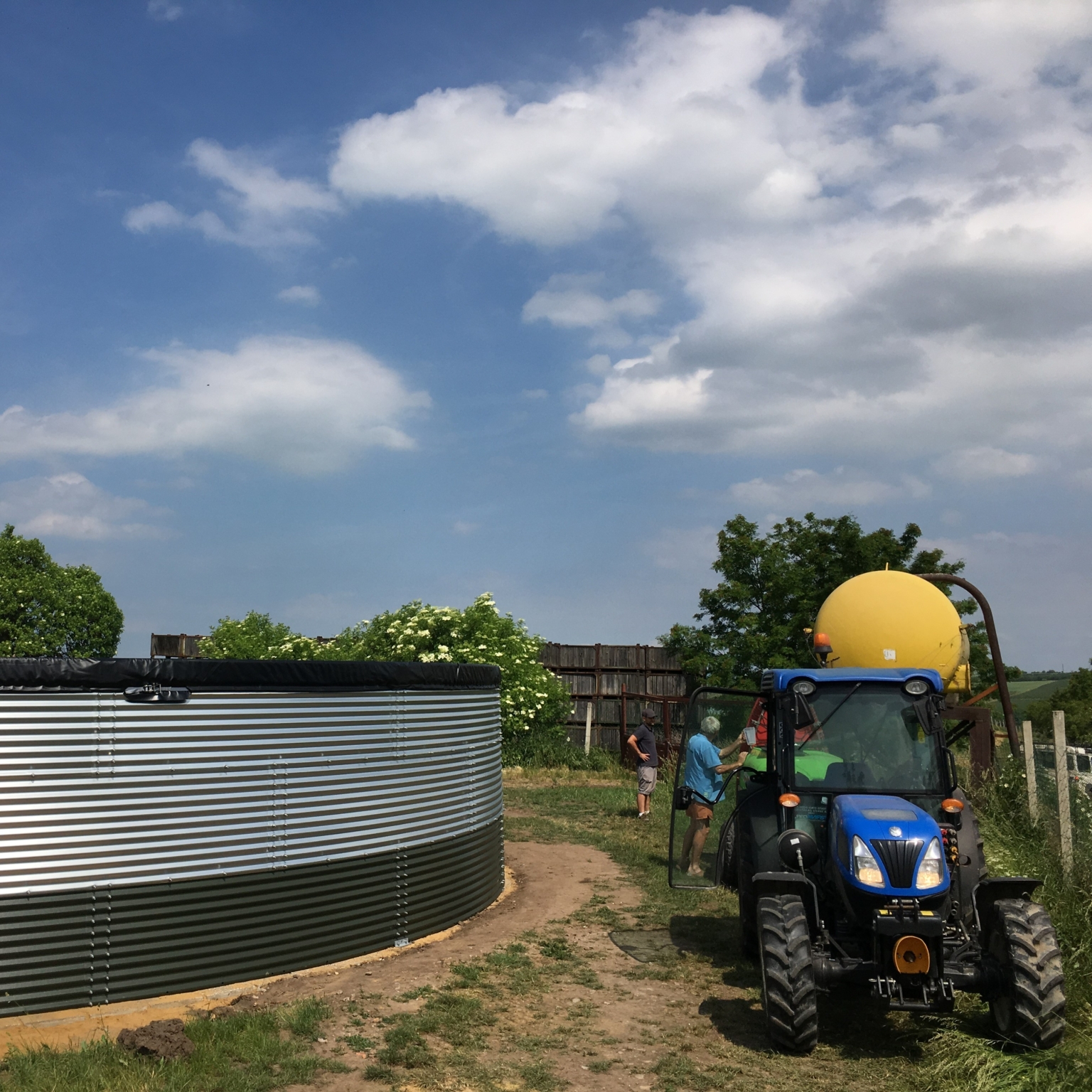 Corrugated steel silo with tractor
