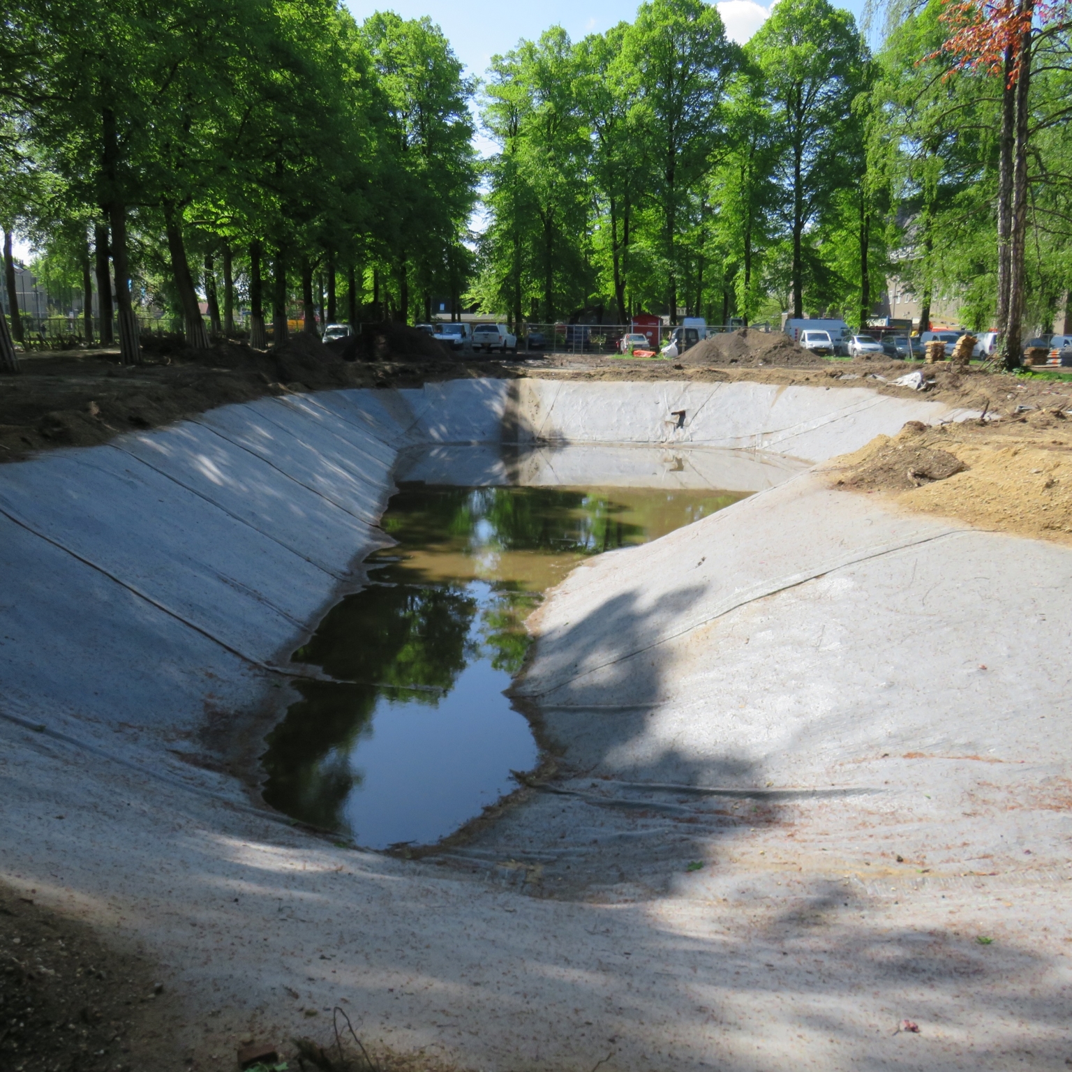 Pond with geosynthetic clay liners