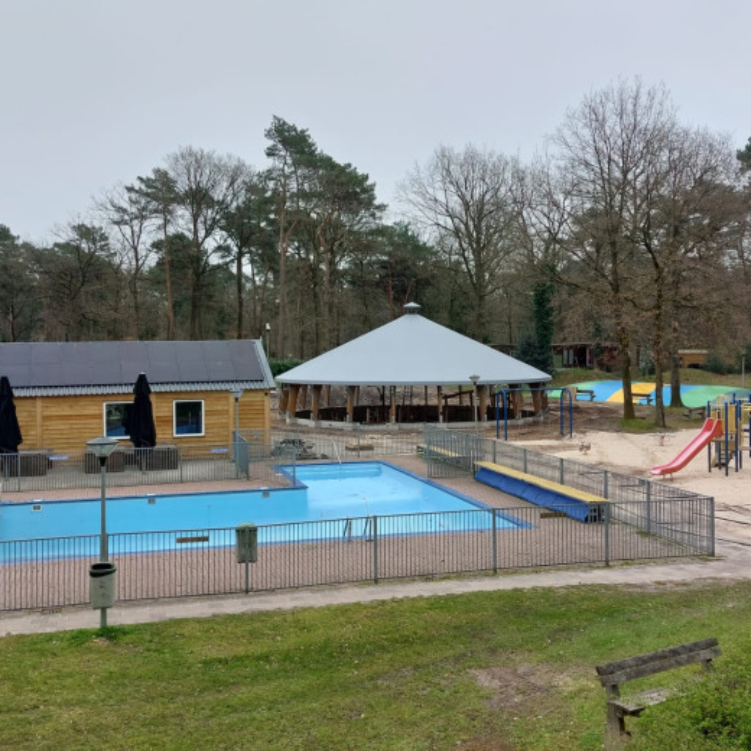 Membrane covering with swimming pool in the foreground