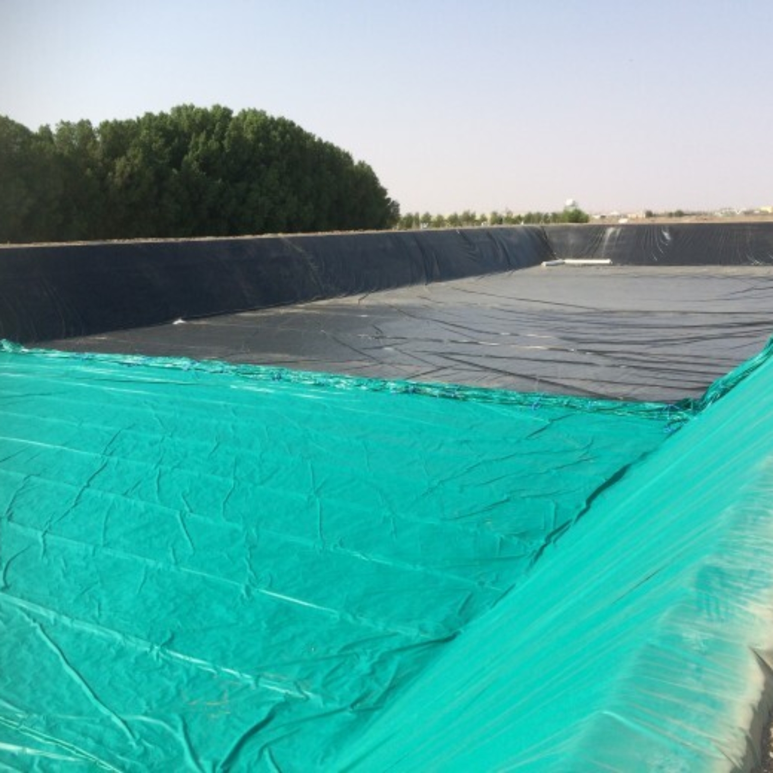 Closed reservoir under construction at Al Dahra