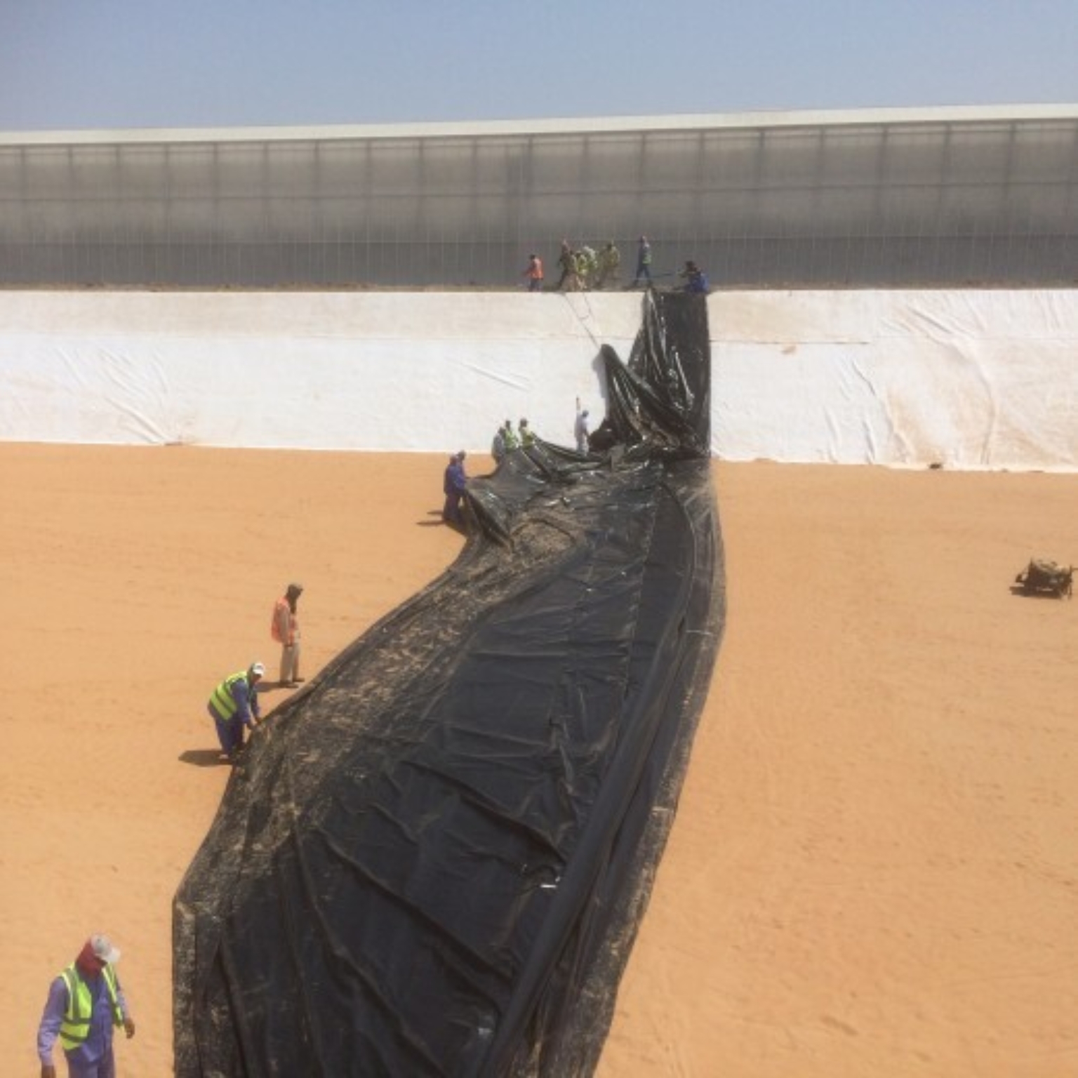 Laying out liners at Al Dahra