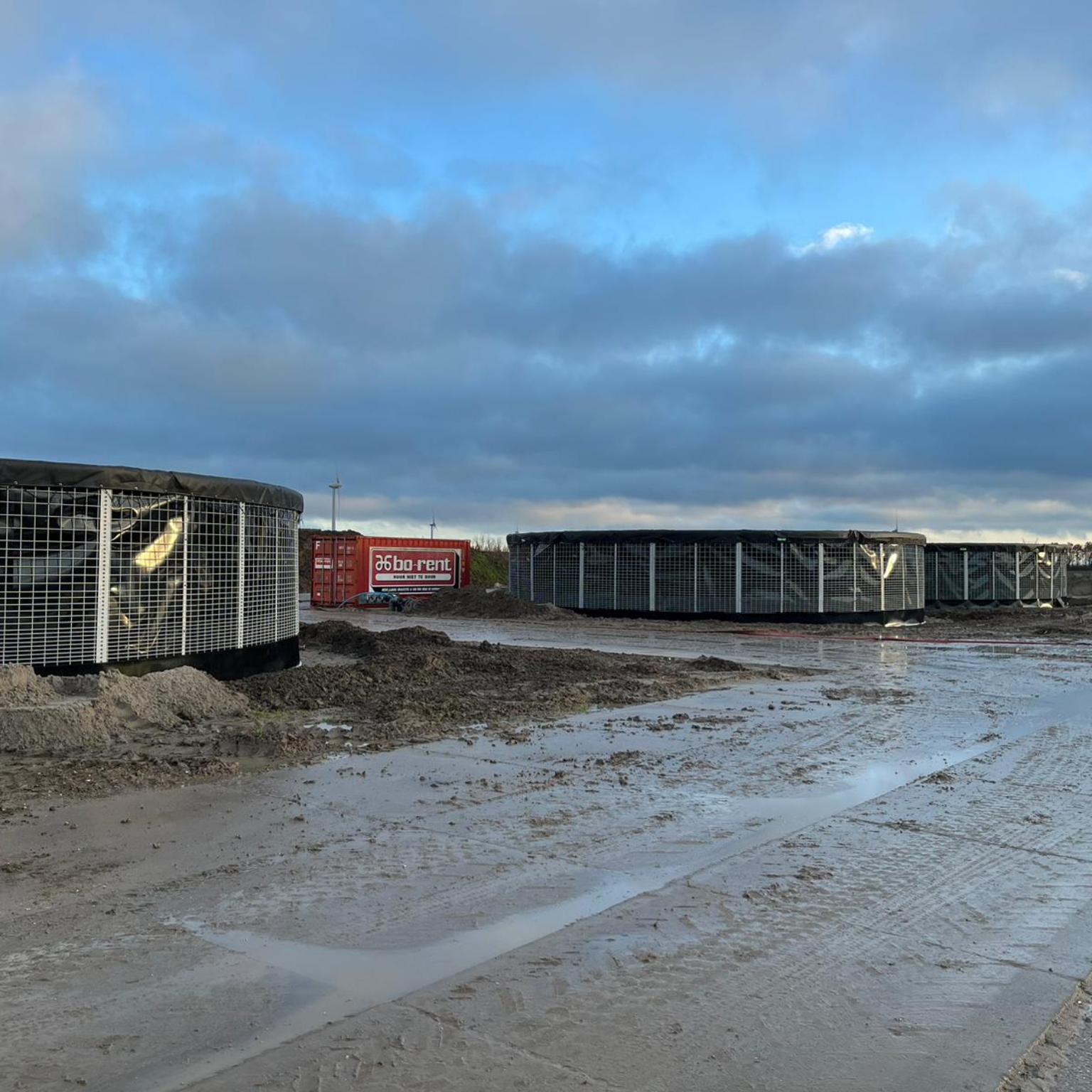 Three slurry silos seen from the side