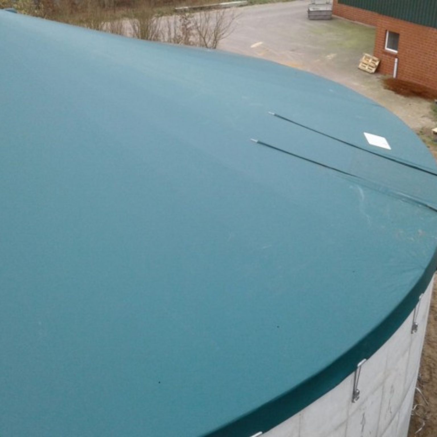 Top view of tensioned cover on slurry silo